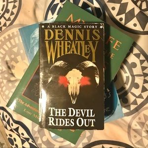 “The Devil Rides Out” by Dennis Wheatley  novel